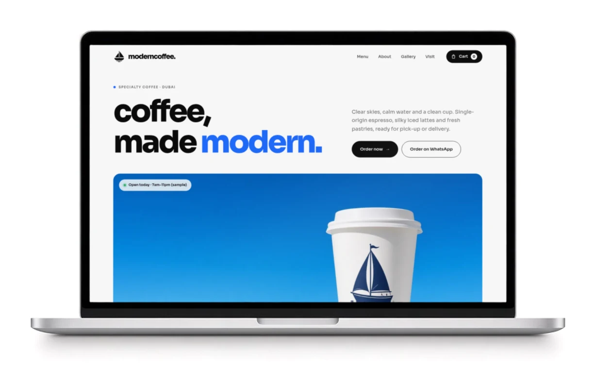 A silver MacBook showing the moderncoffee website, one of our sample builds